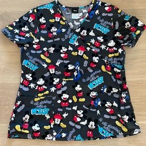 Women’s Mickey Mouse scrub top.